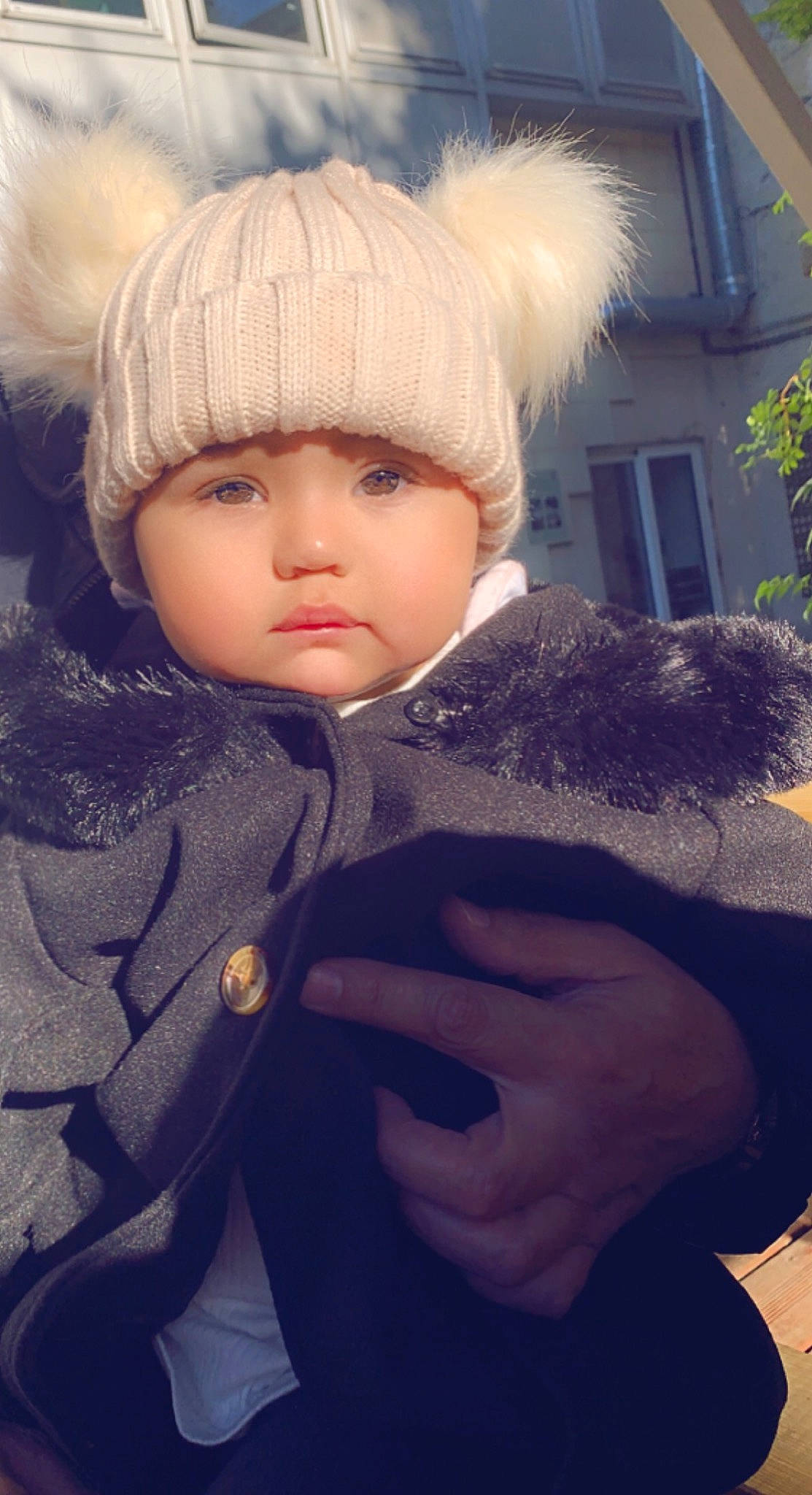 Catalina participe au concours pour gagner de l'argent avec cette photo : beanie, cap, cheek, child, electric_blue, fashion_accessory, freezing, fur, fur_clothing, gesture, happy, headgear, knit_cap, outerwear, toddler, tradition, tree, winter, wool, woolen