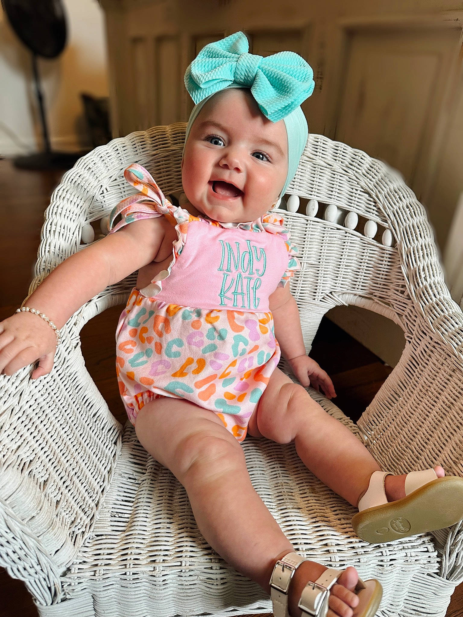 Indy-kate joined the competition — help win amazing prizes! baby, baby_toddler_clothing, chair, child, comfort, event, face, fashion_accessory, foot, happy, hat, headgear, headwear, human_leg, pattern, person, pink, skin, smile, textile