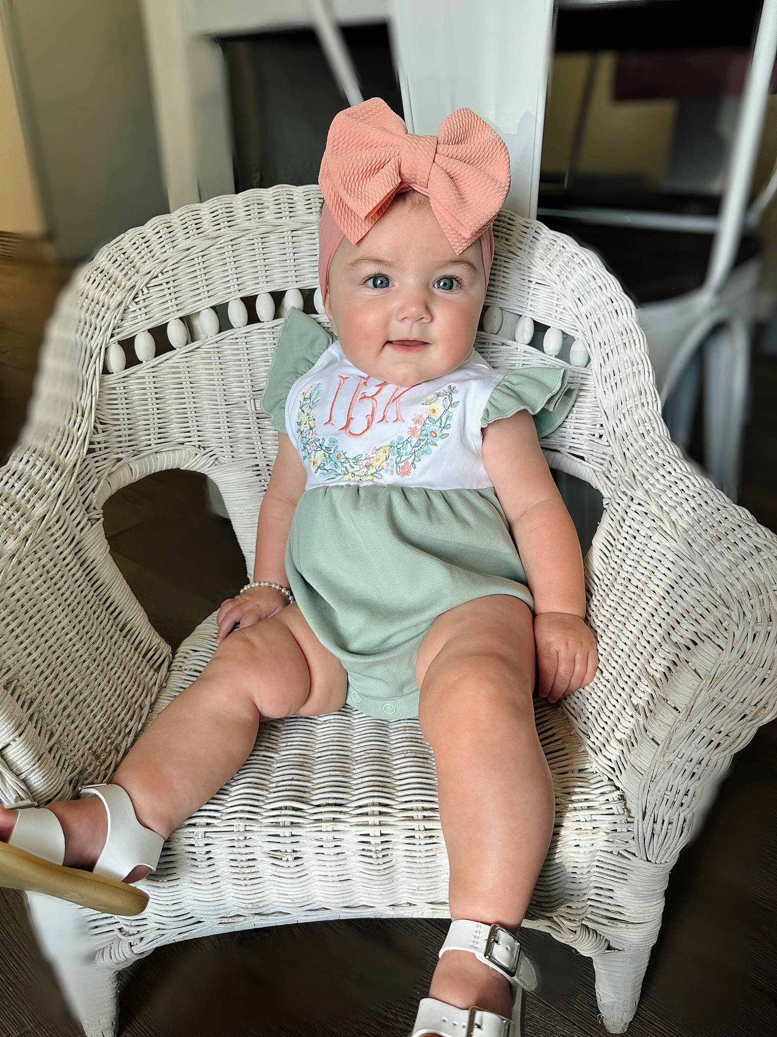 Indy-kate is registered to the contest to win money with this photo: baby, baby_toddler_clothing, cap, chair, comfort, fashion_accessory, fashion_design, headwear, human_leg, jewellery, knee, lap, leg, pattern, person, pink, sitting, sock, textile, thigh