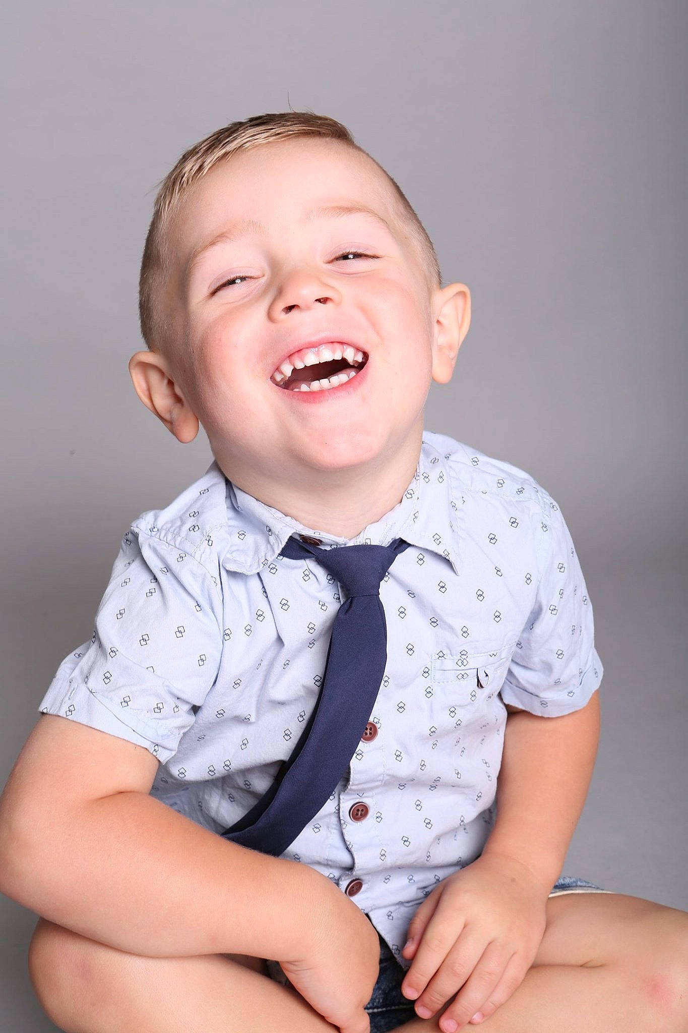 Nixon is registered to the contest to win money with this photo: baby, baby_laughing, cheek, child, child_model, chin, facial_expression, happy, joy, laugh, mouth, person, photo_shoot, photography, portrait, portrait_photography, sitting, smile, tie, toddler
