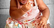 Ciara joined the competition — help win amazing prizes! baby, child, clothing, cute, face, floral, foot, hand, headband, headwear, indoors, infant, person, playful, portrait, sitting, skin, skirt, smiling, soft_surface