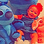 baby, child, colorful, cozy, cute, denim_dress, elephant, happy, indoor, playful, plush_toy, portrait, red_headband, sitting, smiling, soft_toys, stitch, stuffed_animal, toy_collection, white_booties