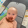 baby, child, messy, chocolate, smile, happy, face, skin, sitting, bouncer, mesh, indoor, floor, infant, cute, fun, playtime, food, mouth, expression