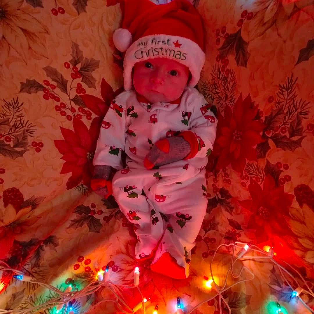 Keith joined the competition — help win amazing prizes! art, baby, baby_toddler_clothing, carmine, christmas, christmas_decoration, christmas_eve, christmas_ornament, event, head, headwear, holiday, holiday_ornament, magenta, ornament, pattern, person, petal, pink, red