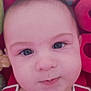 Dino participe au concours pour gagner de l'argent avec cette photo : baby, face, child, close_up, red_clothing, suspenders, toy, plush_toy, indoor, infant, cute, portrait, smile, skin, head, eyebrows, eyes, cheeks, baby_face, soft_background