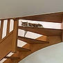 animal, architecture, brown, calm, cat, domestic_cat, furniture, home, horizontal, indoor, lounging, paw, pet, railing, relaxed, resting, stairs, white, wood, wooden_stairs