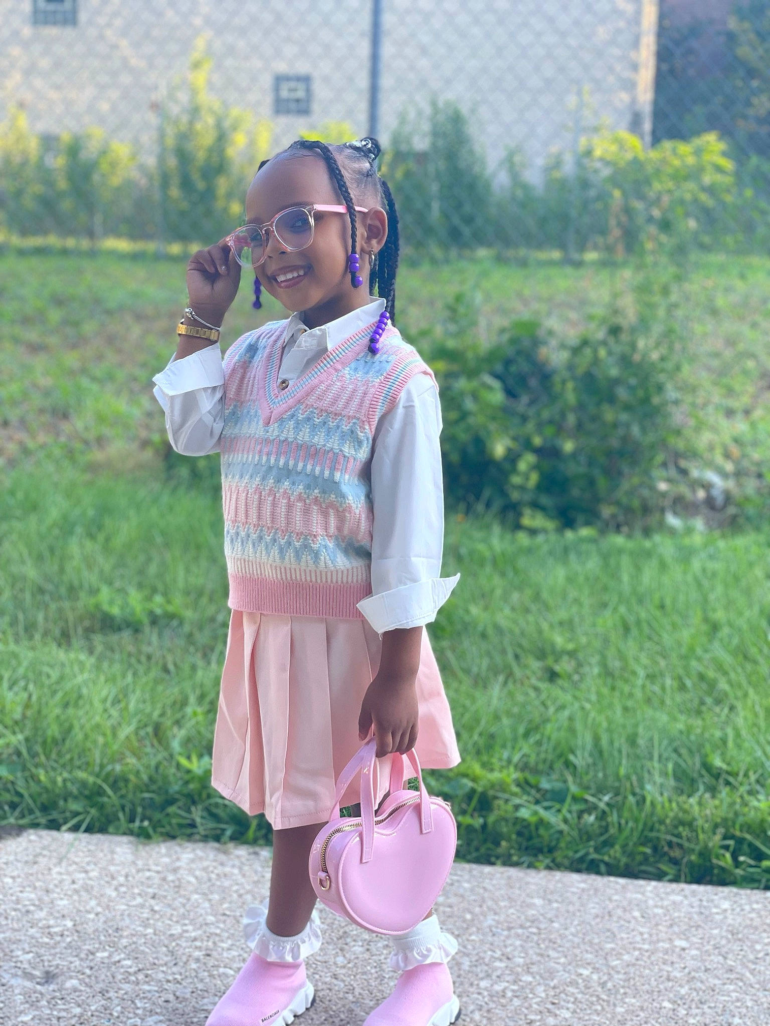 Layah joined the competition — help win amazing prizes! baby_toddler_clothing, child, dress, eyewear, fun, grass, happy, joy, leisure, magenta, morning, person, pink, plaid, plant, purple, sleeve, smile, summer, sunglasses