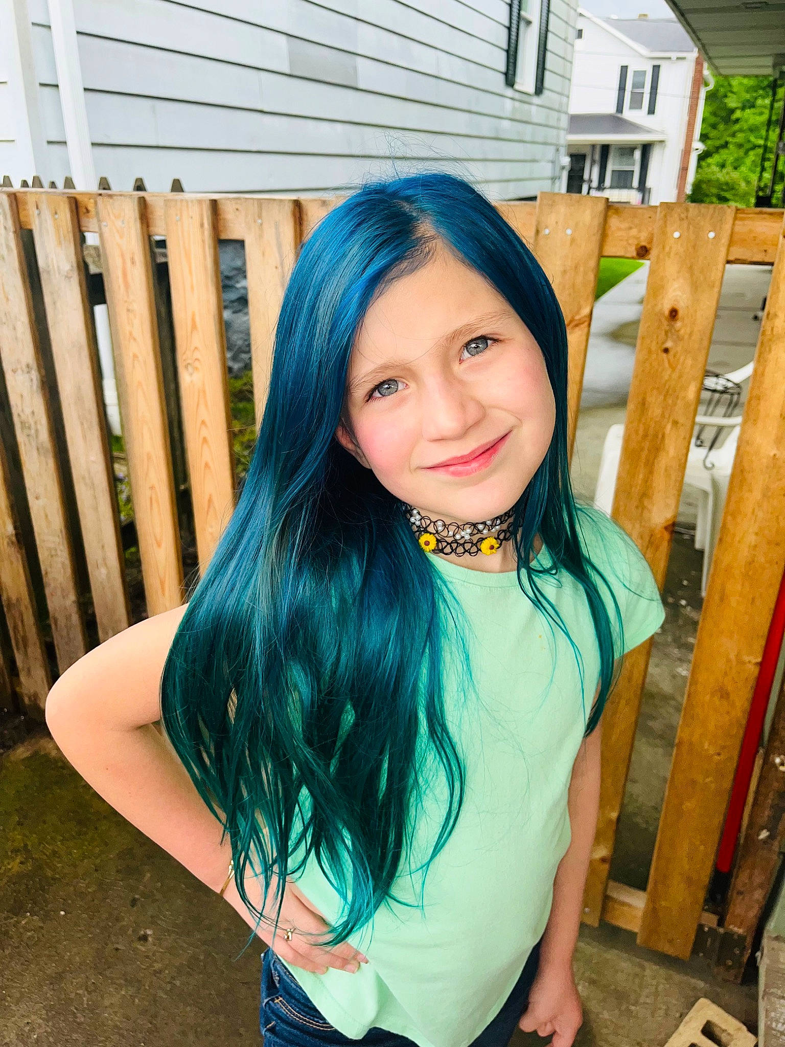 Maree is registered to the contest to win money with this photo: aqua, bangs, black_hair, blue, eyebrow, eyelash, face, facial_expression, flash_photography, grass, hair, happy, headwear, iris, joy, leisure, lip, person, plant, skin