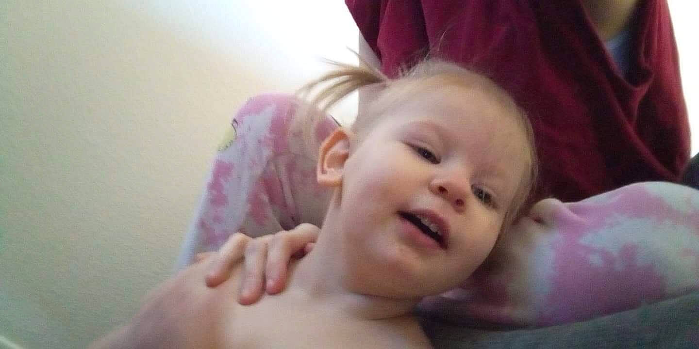 Willow is registered to the contest to win money with this photo: arm, baby, cheek, chin, comfort, ear, eye, eyebrow, eyelash, forehead, gesture, happy, head, iris, lip, mouth, nose, person, purple, skin