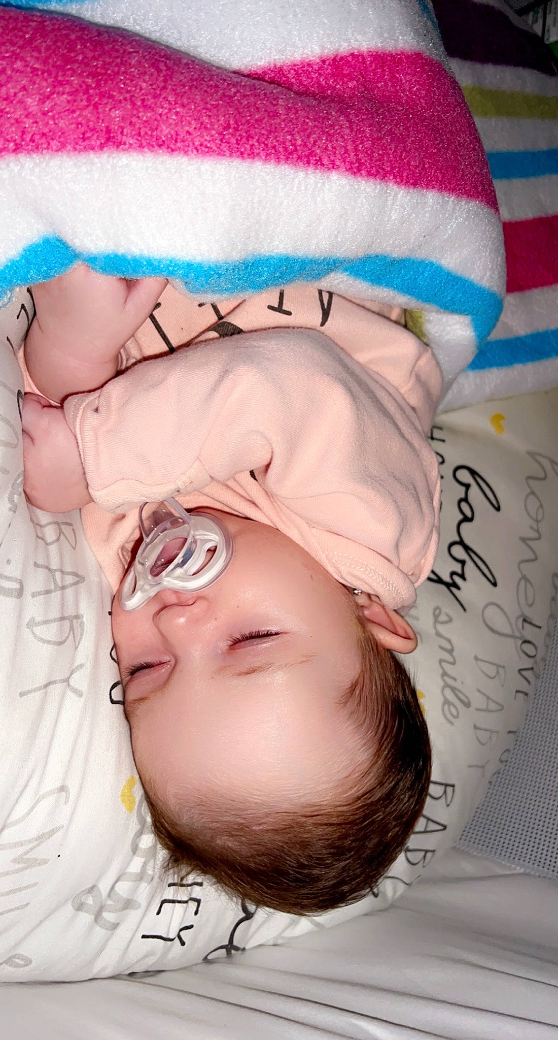 Remi joined the competition — help win amazing prizes! baby, baby_sleeping, baby_toddler_clothing, blue, cap, child, comfort, eyelash, fashion_accessory, font, hair_accessory, happy, headband, headpiece, mouth, pattern, person, pink, skin, textile