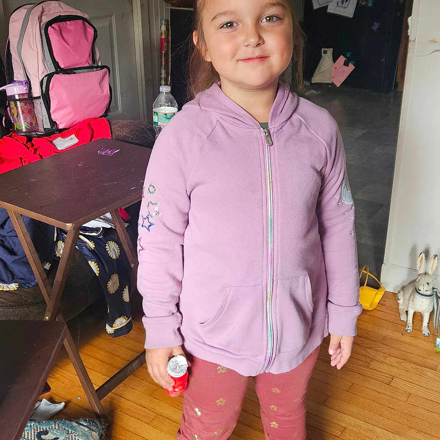 Grace joined the competition — help win amazing prizes! adult, bag, child, clothing, coat, face, female, footwear, girl, hardwood, head, pants, person, photography, plywood, portrait, shoe, standing, woman, wood