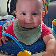 Stephen joined the competition — help win amazing prizes! baby, child, infant, bib, activity_center, toy, play, smile, face, indoor, furniture, home, carpet, clothing, person, cute, cheerful, hand, seat, happy