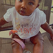 Aniya is registered to the contest to win money with this photo: adorable, baby, bib, chair, child, closeup, clothing, cute, expression, face, indoor, infant, love, pacifier, person, portrait, seated, socks, wicker, young