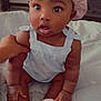 Aniya joined the competition — help win amazing prizes! baby, child, infant, pink_bonnet, white_sandals, sitting, bed, hand, curious, cute, indoors, clothing, footwear, person, portrait, young_child, skin, face, eyes, expression