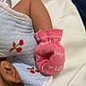 Samantha Lior joined the competition — help win amazing prizes! newborn, baby, sleeping, infant, portrait, close_up, pink_mitten, blue_clothing, white_bedding, bed, arm, hand, ear, hair, face, textile, indoors, cozy, peaceful, photography