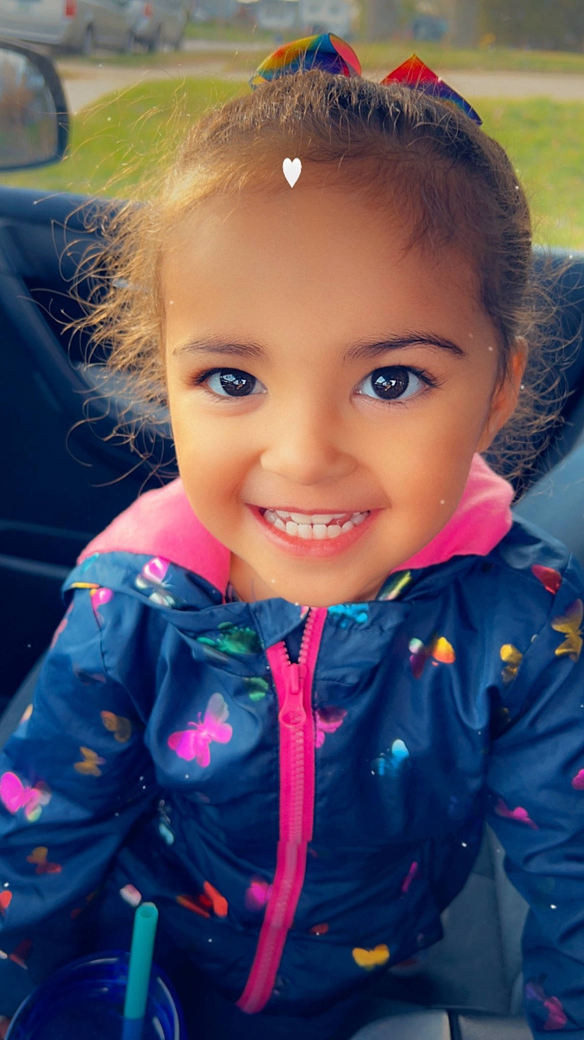 Amira is registered to the contest to win money with this photo: baby_toddler_clothing, child, chin, cool, electric_blue, eyebrow, eyelash, fun, grass, hairstyle, happy, human, iris, joy, lip, nose, person, pink, skin, sleeve