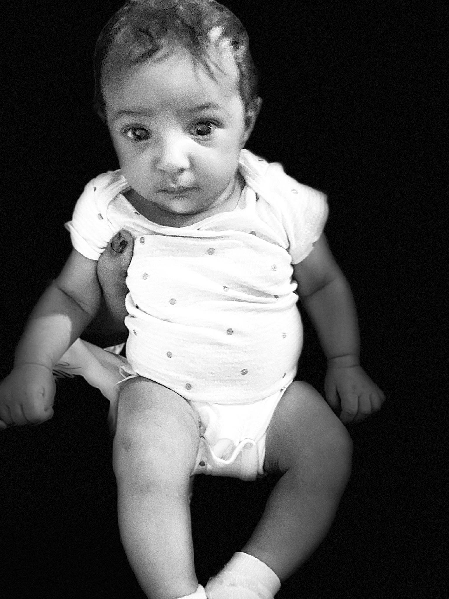 Jasmine is registered to the contest to win money with this photo: baby, baby_toddler_clothing, black, black_and_white, cheek, elbow, eye, finger, flash_photography, hand, happy, human_body, iris, leg, lip, mouth, person, skin, sleeve, style