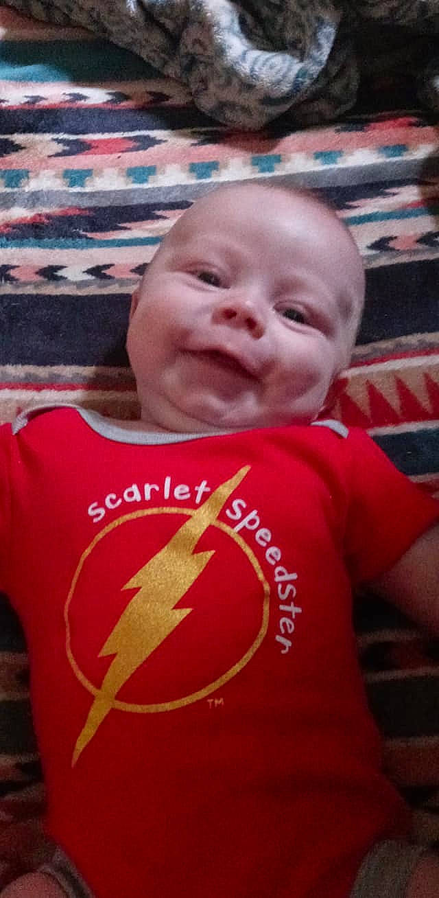 Owen Wyatt is registered to the contest to win money with this photo: baby, baby_toddler_clothing, cool, facial_expression, fun, hairstyle, happy, human, lip, mammal, mouth, muscle, person, pink, product, skin, sleeve, smile, t_shirt, toddler