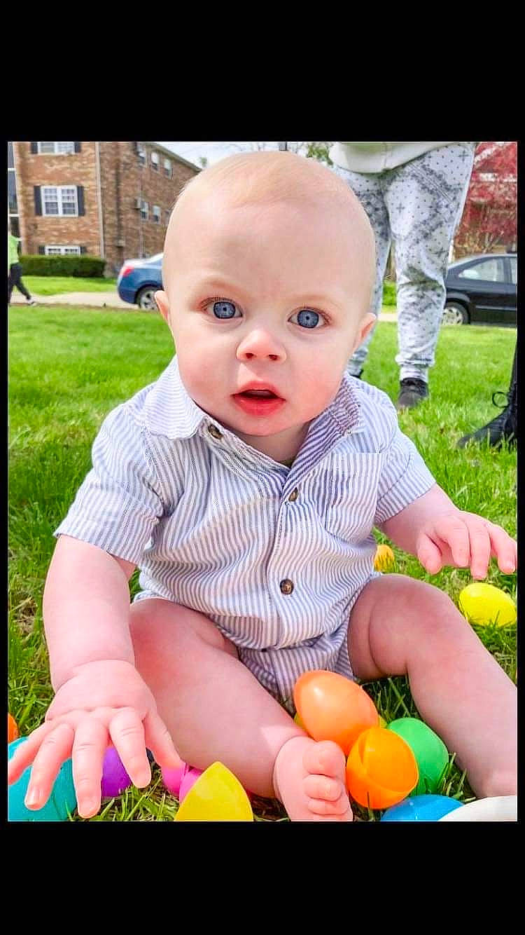Owen is registered to the contest to win money with this photo: baby, baby_toddler_clothing, cheek, child, fun, grass, happy, head, iris, lawn, natural_foods, people_in_nature, person, photograph, plant, product, skin, snapshot, summer, surprise