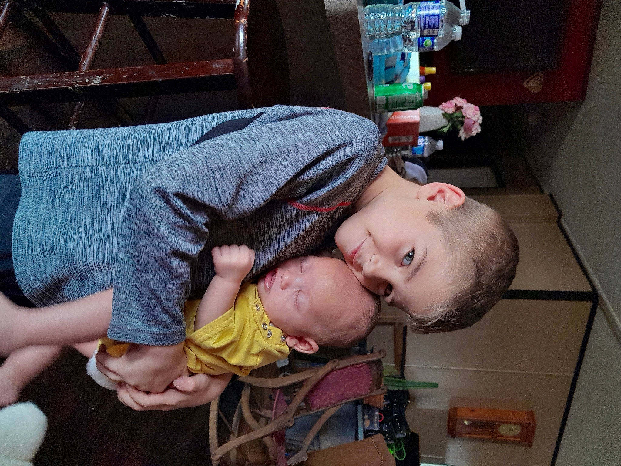 Blaine Lucas Farmer is registered to the contest to win money with this photo: baby, baby_products, baby_toddler_clothing, child, comfort, fun, happy, mammal, mouth, people, person, room, sitting, toddler, vacation