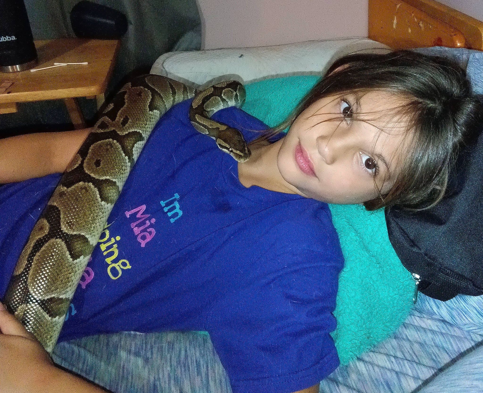 Mia Lee Farmer joined the competition — help win amazing prizes! arm, black_hair, comfort, cool, elbow, finger, happy, human_body, human_leg, joint, knee, lap, leg, neck, person, reptile, sleeve, smile, textile, thigh