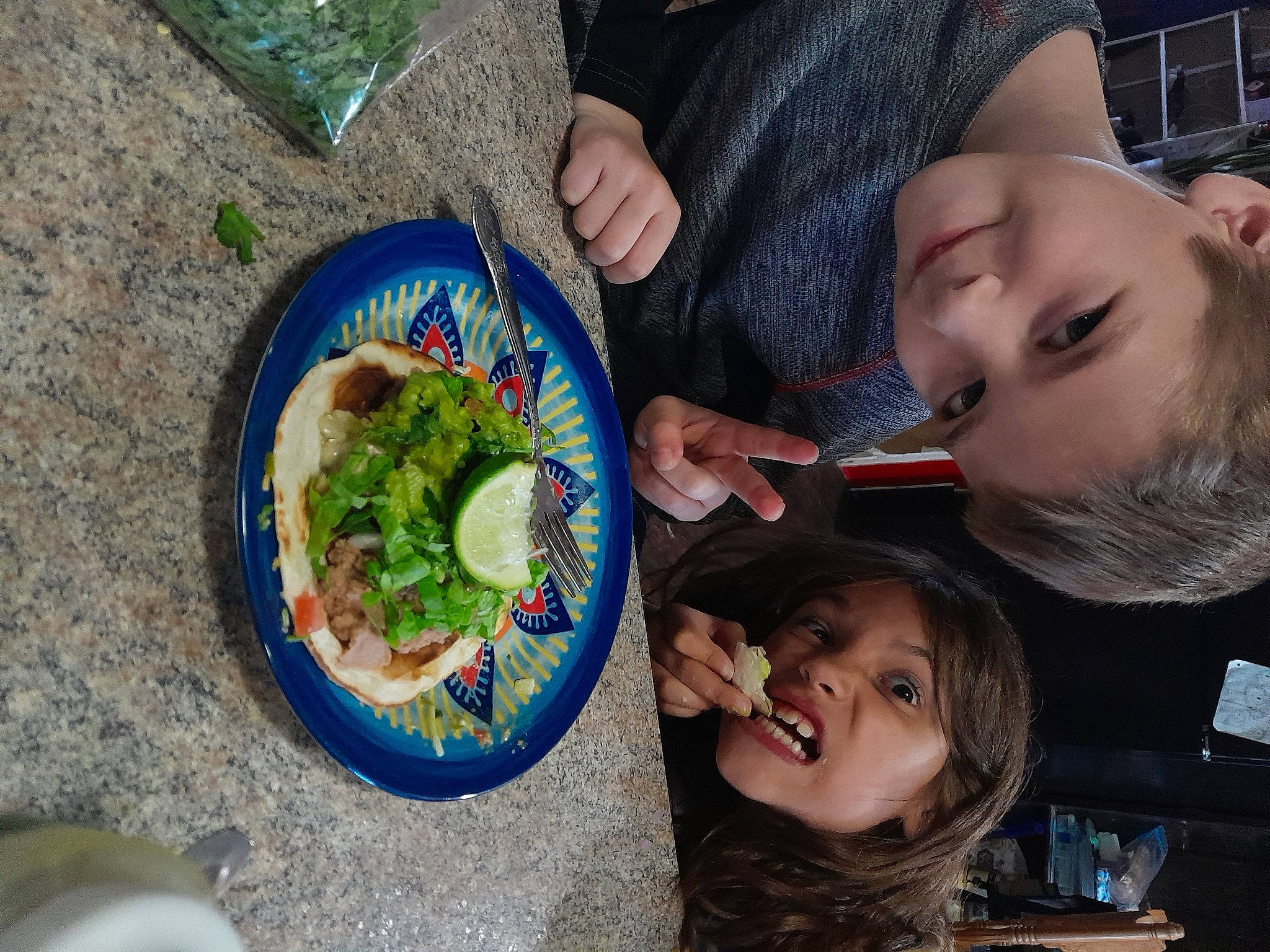 Mia Lee Farmer is registered to the contest to win money with this photo: chair, child, circle, comfort_food, cuisine, dish, food, fun, grass, happy, hat, ingredient, joy, leisure, person, plate, recreation, sharing, smile, tableware