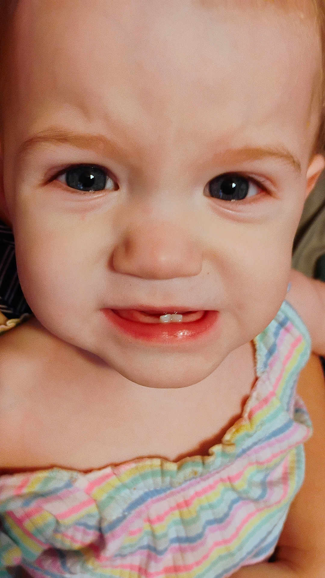 Freya joined the competition — help win amazing prizes! baby, close_up, child, face, eyes, teeth, skin, expression, curious, colorful_clothing, striped, person, portrait, innocence, young, cute, infant, head, mouth, happy