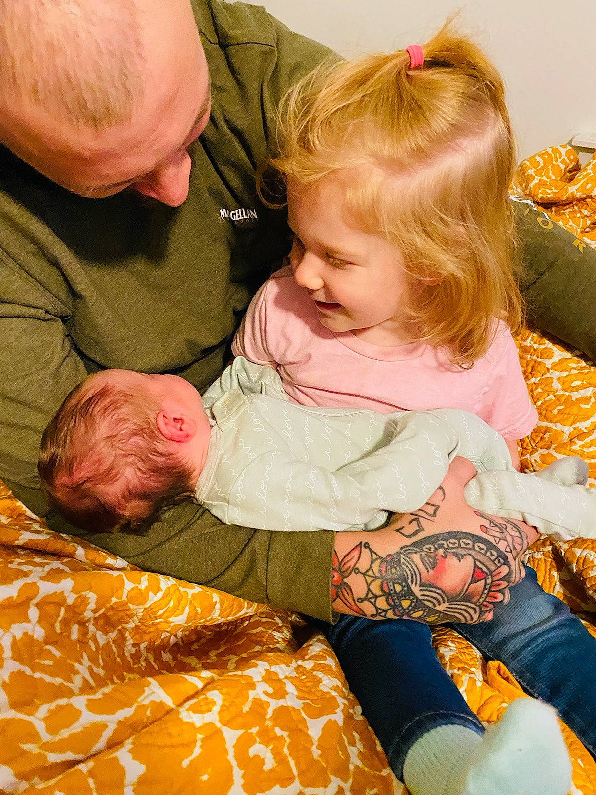 Rowan is registered to the contest to win money with this photo: baby, baby_toddler_clothing, beauty, child, comfort, event, face, facial_expression, fun, grass, happy, joy, lap, people, person, playing_with_kids, product, sitting, skin, smile