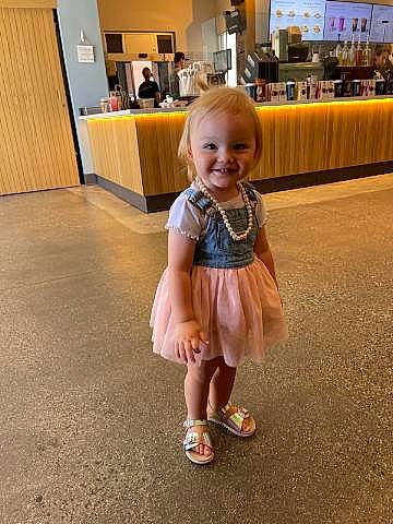 Calliope joined the competition — help win amazing prizes! baby, baby_toddler_clothing, child, event, flip_flops, floor, flooring, foot, fun, happy, hardwood, human_leg, joy, leisure, person, room, sandal, sitting, skin, smile