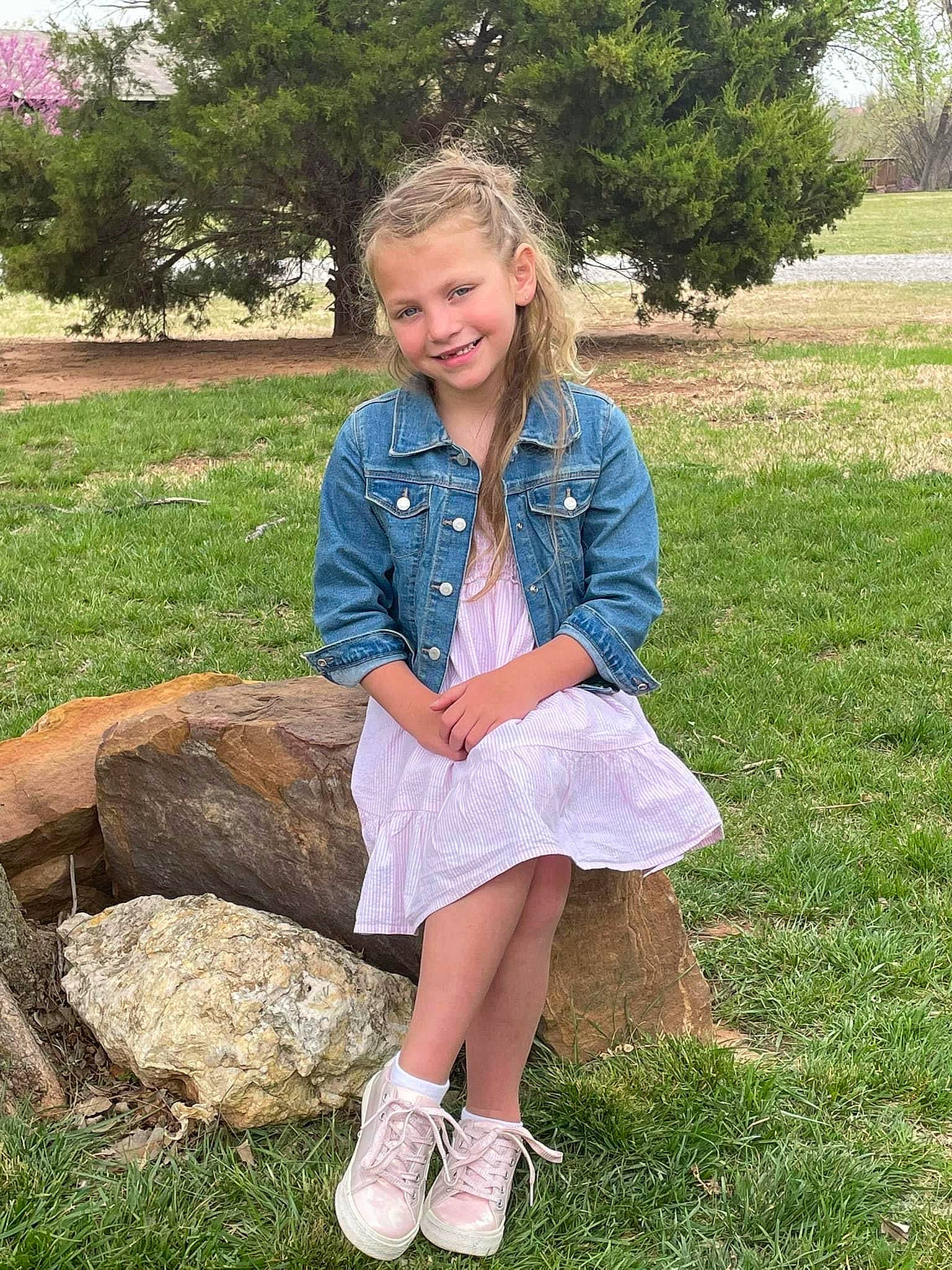 Saylor is registered to the contest to win money with this photo: botany, denim, electric_blue, fawn, grass, hair, happy, human_leg, joy, knee, long_hair, pattern, people_in_nature, person, pink, plant, sleeve, smile, summer, thigh