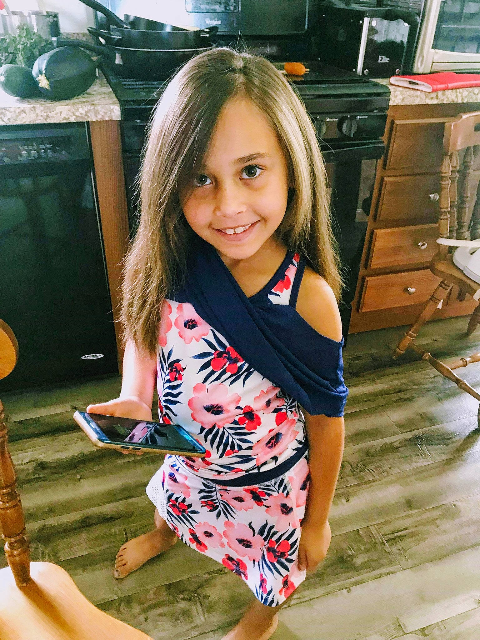 Aleigha is registered to the contest to win money with this photo: blond, brown_hair, child_model, hair, joy, lady, leg, long_hair, person, room, sitting, t_shirt