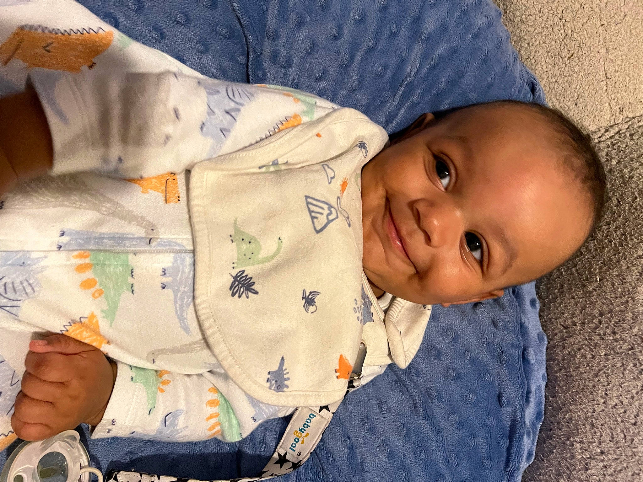 London joined the competition — help win amazing prizes! baby, baby_products, baby_toddler_clothing, cheek, child, comfort, elbow, facial_expression, happy, human, joy, linens, mammal, mouth, nose, person, product, skin, sleeve, smile