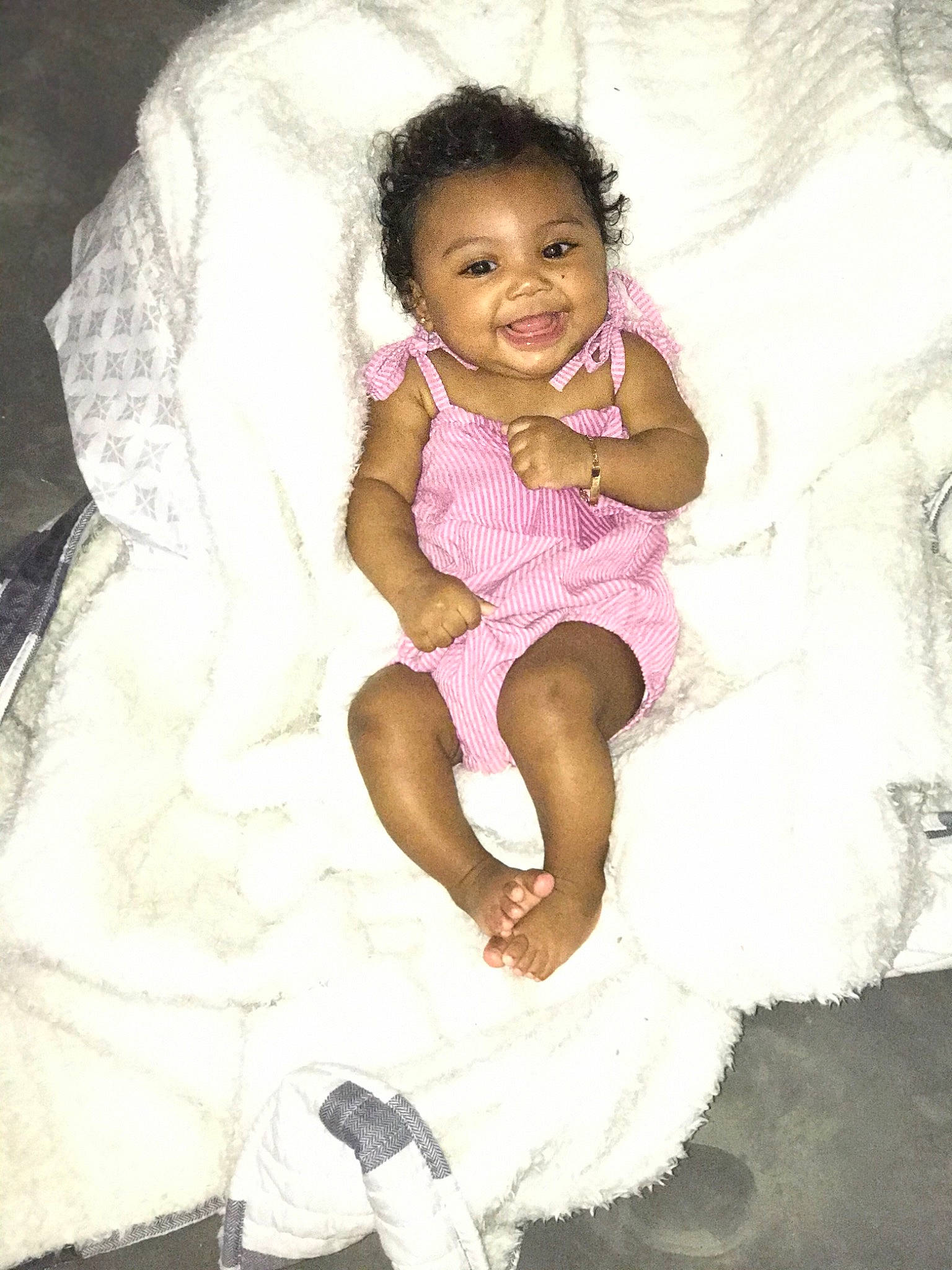 Amour is registered to the contest to win money with this photo: baby_toddler_clothing, child, comfort, dress, eye, face, finger, flash_photography, fun, hand, happy, head, human_body, joy, linens, magenta, person, pink, skin, sleeve