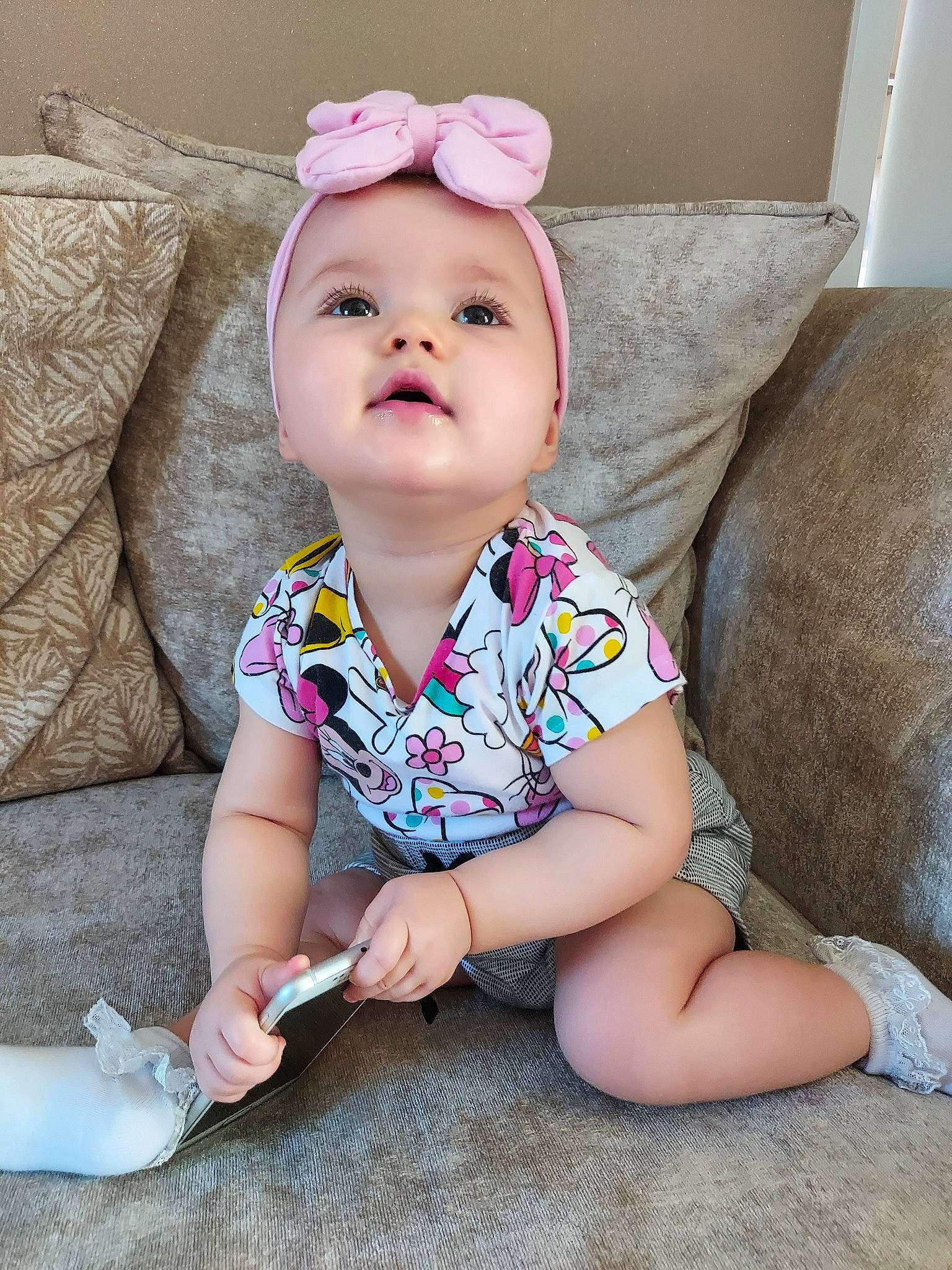 Ava-mae is registered to the contest to win money with this photo: baby, baby_products, baby_toddler_clothing, beauty, cheek, child, dress, fashion_accessory, footwear, hair_accessory, headband, headgear, headwear, leg, person, pink, product, shoe, sitting, skin