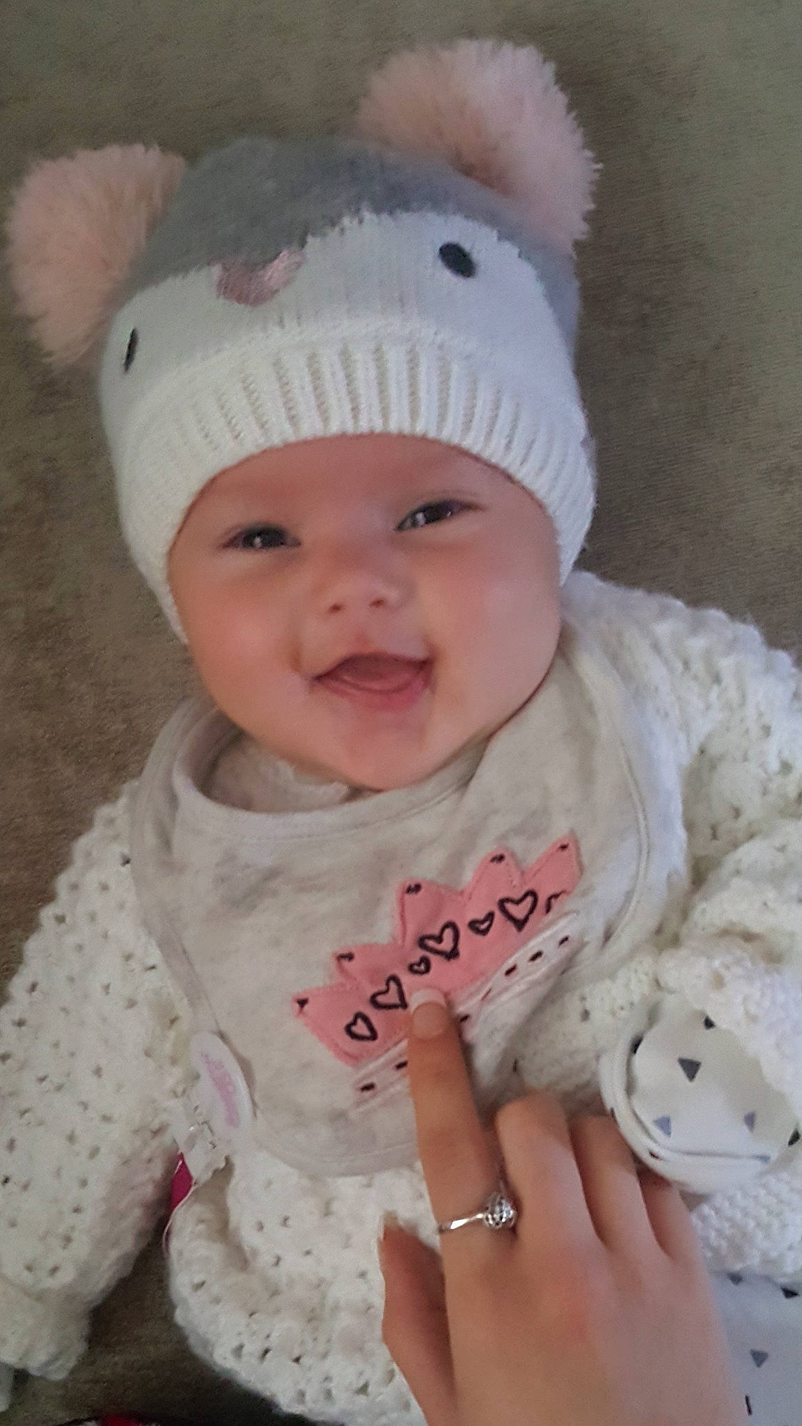 Ava-mae is registered to the contest to win money with this photo: baby, beanie, bonnet, cap, child, clothing, hat, headgear, headwear, knit_cap, knitting, person, pink, toddler, wool