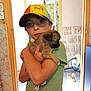 Gabriel a rejoint le concours — aidez-le/la à gagner de superbes lots ! animal, boy, cap, child, cute, dog, doorway, floor, green_shirt, holding, home, indoor, person, pet, pikachu, portrait, puppy, small_dog, vacuum_cleaner, wall
