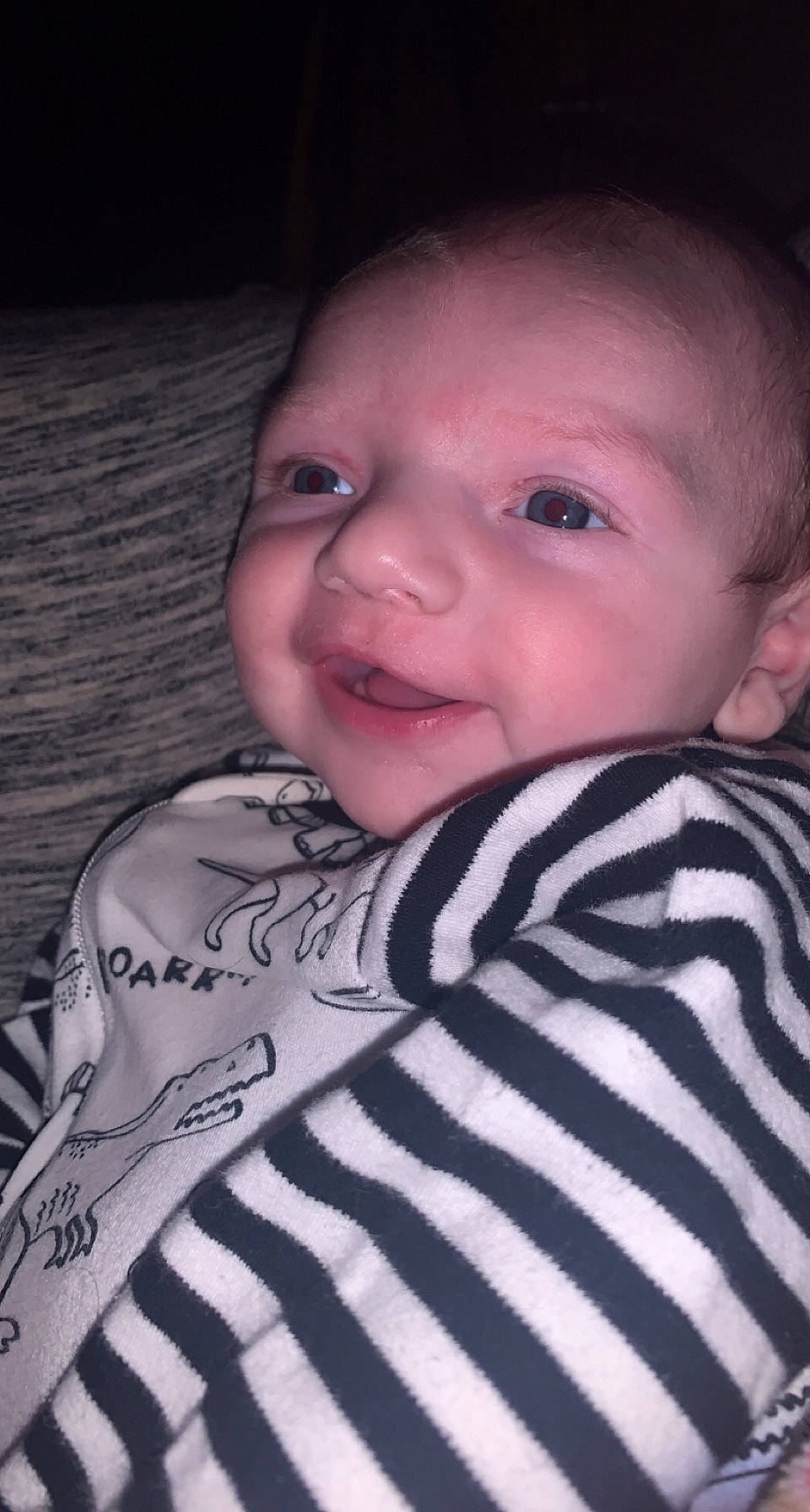 Calvin is registered to the contest to win money with this photo: baby, baby_toddler_clothing, cheek, chin, comfort, eye, eyebrow, face, facial_expression, flash_photography, head, human_body, iris, lip, mouth, neck, nose, person, skin, sleeve