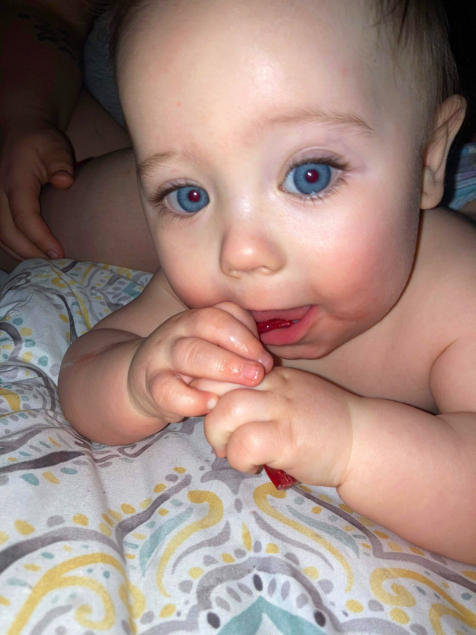 Kieran is registered to the contest to win money with this photo: baby, cheek, chin, ear, eyebrow, eyelash, finger, forehead, gesture, hand, happy, human_body, iris, lip, mouth, muscle, neck, nose, person, skin