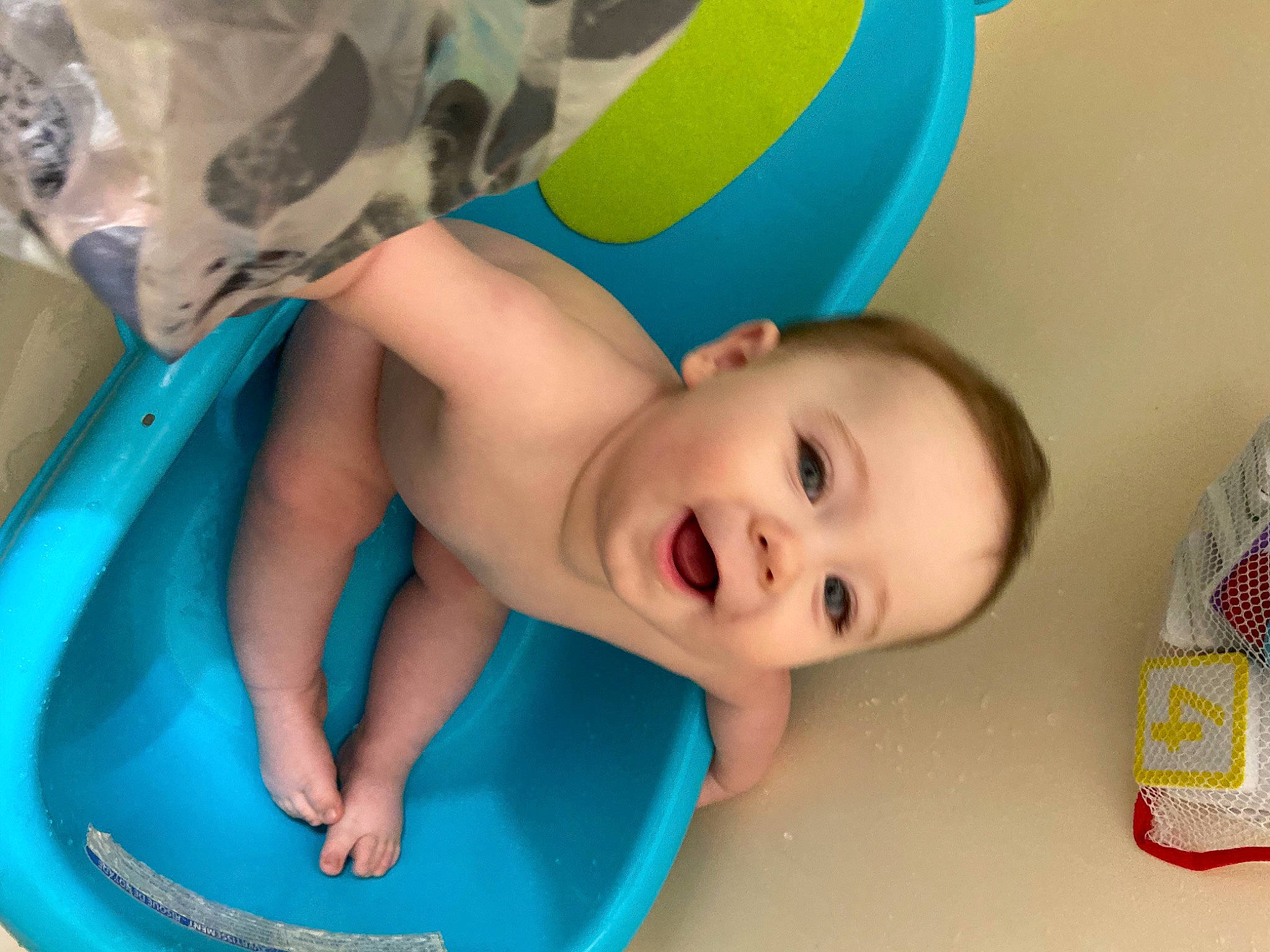 Kieran is registered to the contest to win money with this photo: baby, baby_bathing, baby_playing_with_toys, baby_products, baby_safety, baby_toddler_clothing, bathing, blue, cheek, electric_blue, eyebrow, flooring, fun, happy, leisure, mouth, person, plastic, skin, smile
