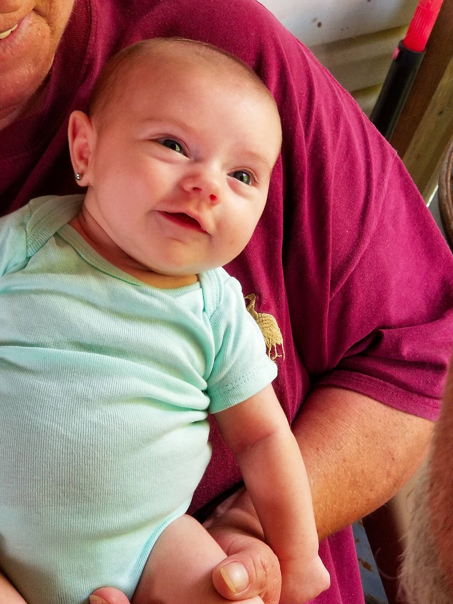 Carleigh is registered to the contest to win money with this photo: baby, beauty, cheek, child, eye, face, facial_expression, finger, hand, head, lip, mouth, nose, people, person, pink, product, sitting, skin, smile