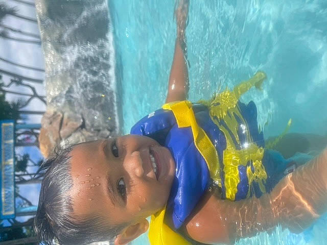 Hercules joined the competition — help win amazing prizes! bathing, chest, child, competition_event, fluid, fun, happy, leisure, leisure_centre, person, personal_protective_equipment, recreation, smile, sports, swimmer, swimming_pool, swimwear, toddler, underwater, vacation