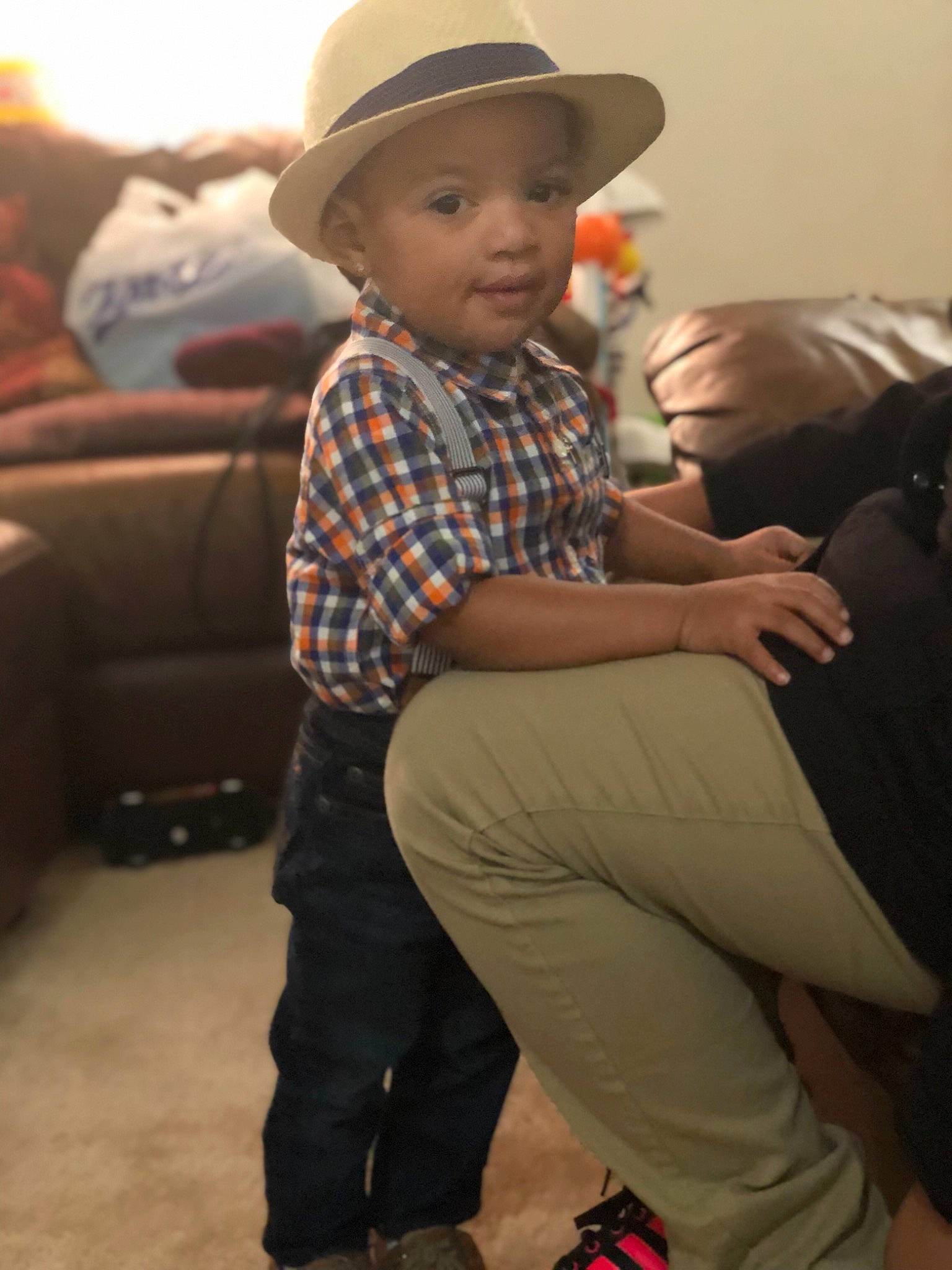 Marques joined the competition — help win amazing prizes! child, fashion_accessory, fedora, hat, headgear, male, outerwear, person, sitting, sun_hat, toddler, vacation