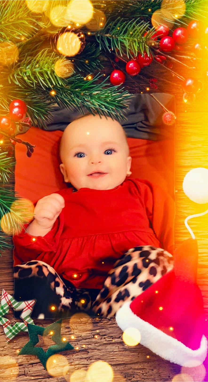 Skyler is registered to the contest to win money with this photo: baby, baby_toddler_clothing, beauty, cheek, child, christmas_decoration, christmas_ornament, christmas_tree, event, eye, facial_expression, happy, head, holiday, holiday_ornament, light, ornament, person, sleeve, smile