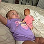 Ally joined the competition — help win amazing prizes! baby, infant, child, doll, bed, purple_shirt, smile, happy, indoor, toy, clothing, diaper, furniture, blanket, person, lying_down, cute, pink, room, home