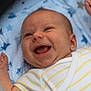 Aleks participe au concours pour gagner de l'argent avec cette photo : baby, smiling, infant, onesie, yellow_stripes, blanket, star_pattern, happy, face, cheerful, cute, child, newborn, portrait, skin, lying_down, expression, closeup, hand, baby_clothes