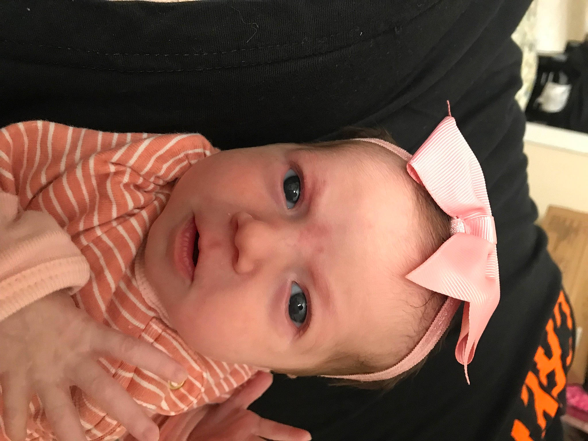 Mckinley is registered to the contest to win money with this photo: baby, baby_toddler_clothing, cheek, ear, eye, eyebrow, eyelash, flash_photography, hand, hat, human_body, iris, jaw, lip, mouth, neck, nose, person, skin, smile