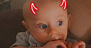 Ryland joined the competition — help win amazing prizes! baby, child, adult, person, face, hand, clothing, shirt, graphic, sunglasses, red_overlay, devil_horns, heart, indoor, curious, cute, holding, portrait, expression, skin