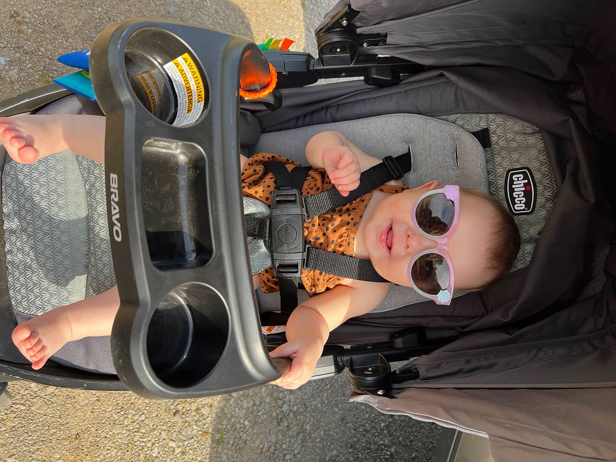 Fallon is registered to the contest to win money with this photo: audio_equipment, auto_part, automotive_design, automotive_exterior, automotive_lighting, automotive_tire, automotive_wheel_system, baby, baby_carriage, baby_products, baby_toddler_clothing, bumper, car_seat, comfort, fun, gas, motor_vehicle, person, tire, toddler