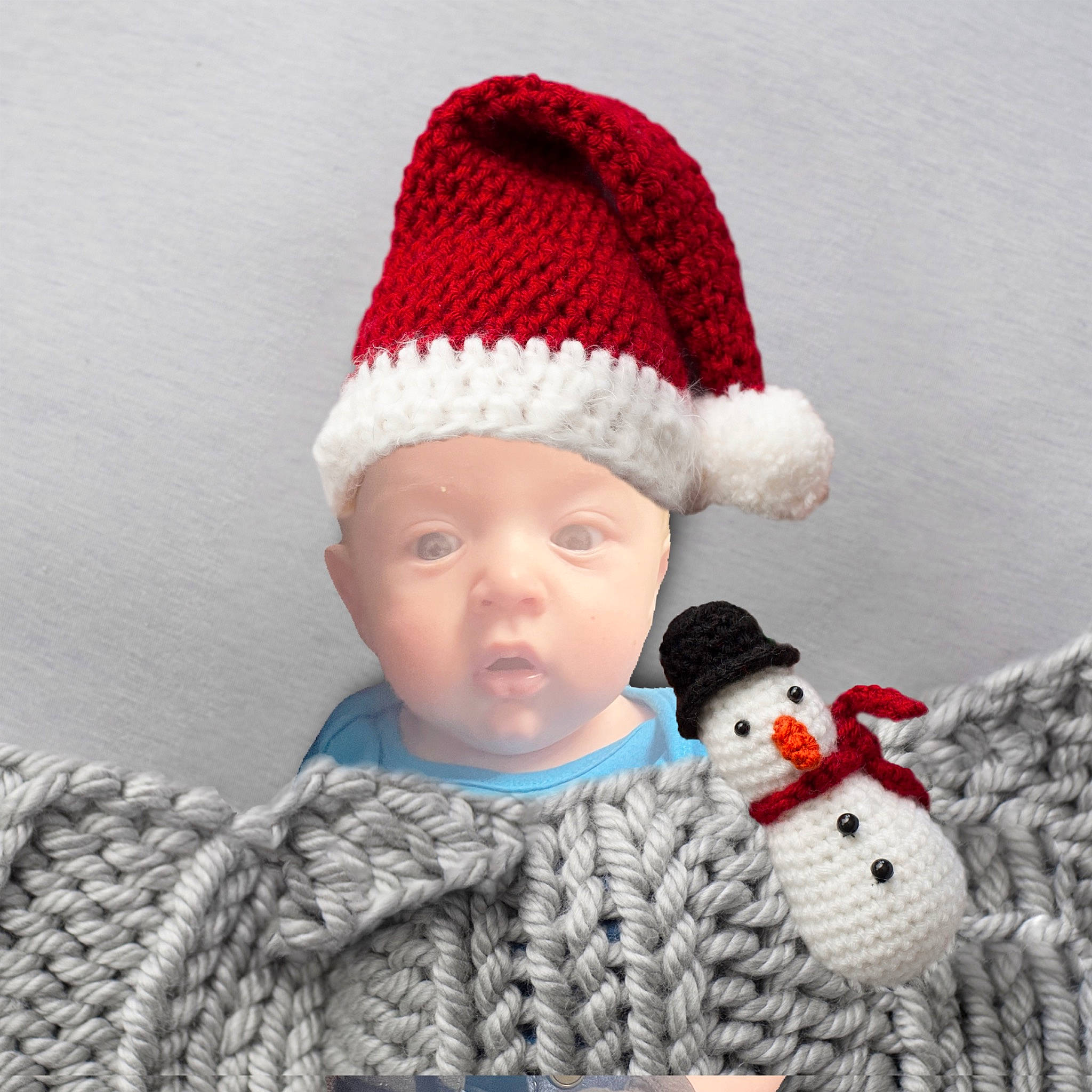 Lawrence joined the competition — help win amazing prizes! art, baby_toddler_clothing, cap, costume_hat, craft, creative_arts, design, face, fashion_accessory, fur, headgear, headwear, knit_cap, outerwear, pattern, person, sleeve, snowman, textile, toddler