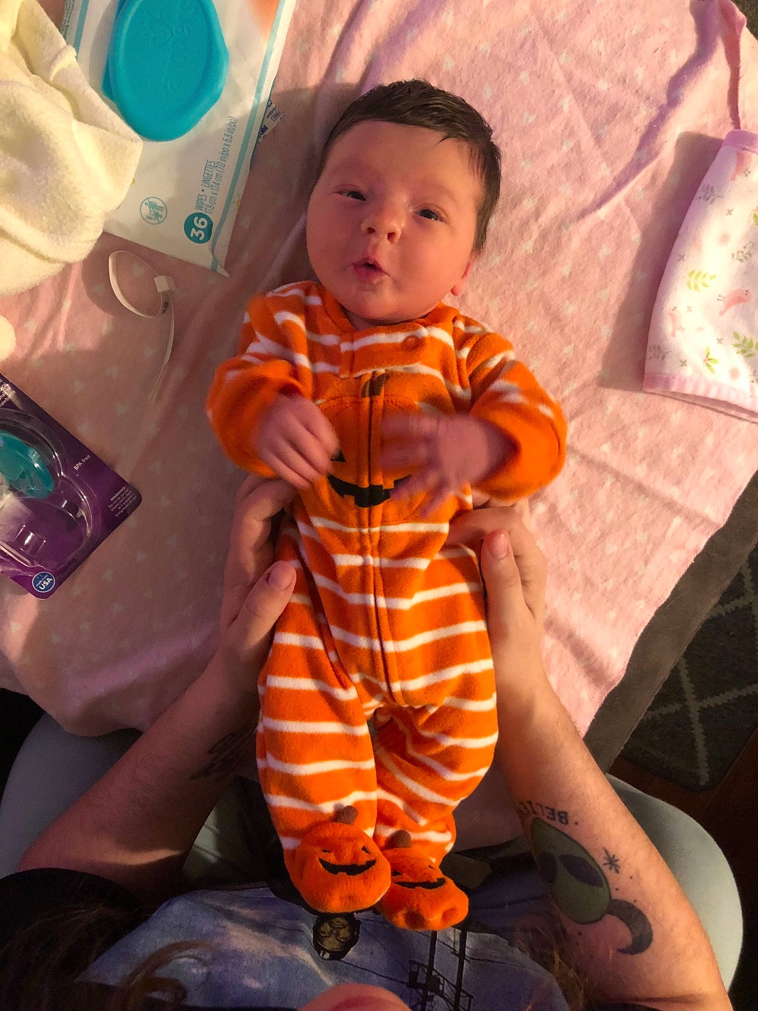 Novah joined the competition — help win amazing prizes! baby, baby_toddler_clothing, chair, child, comfort, cool, finger, fun, happy, mouth, orange, pattern, person, plate, product, sitting, skin, sleeve, tableware, toddler